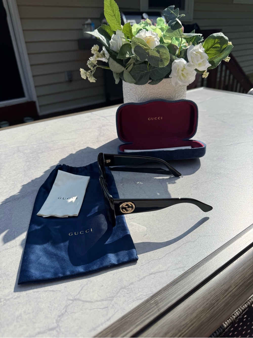 Gucci Black Sunglasses with Gold GG Temple Accents